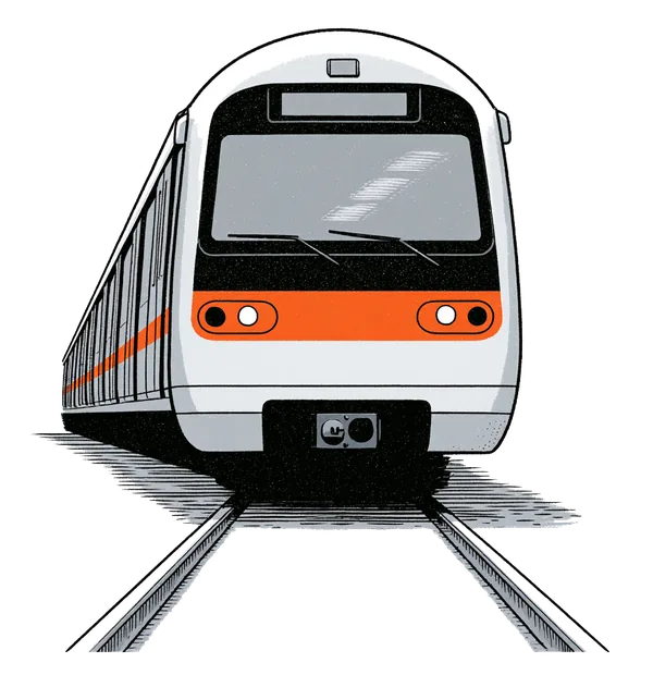 A Delhi Metro train approaching head-on down the tracks, headlights like eyes.
